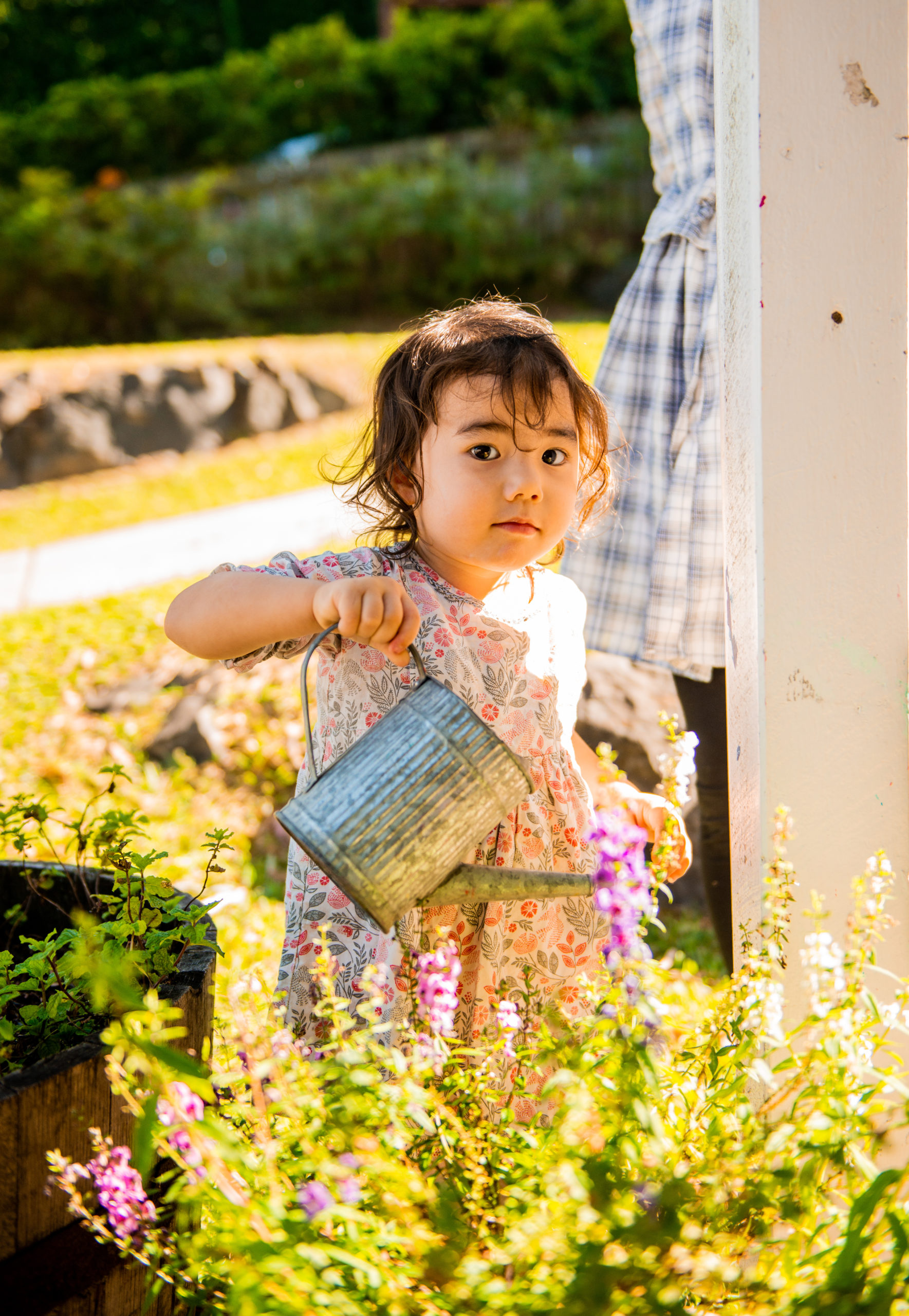 Watering the garden at the Infants' House