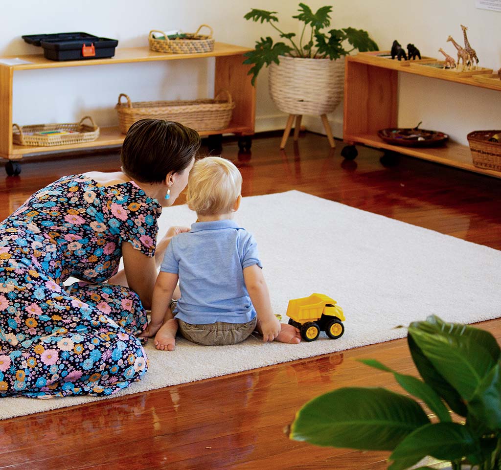 A mother and her child at the Montessori Infants' House
